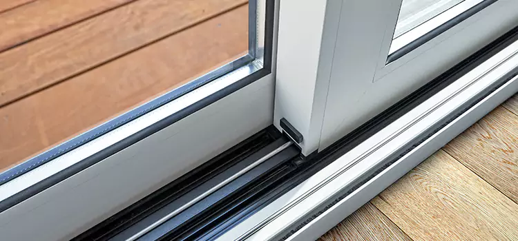Why Your Sliding Door Keeps Getting Stuck in New Lenox, IL?